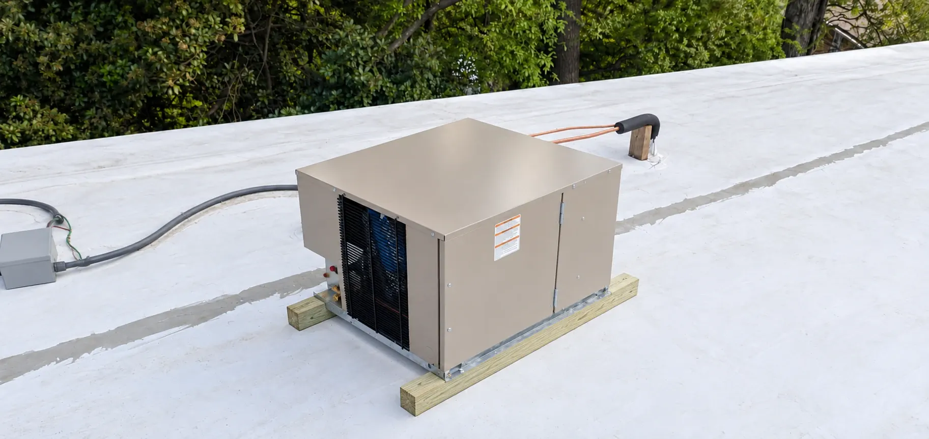 Rooftop condensing unit supported on two wooden beams